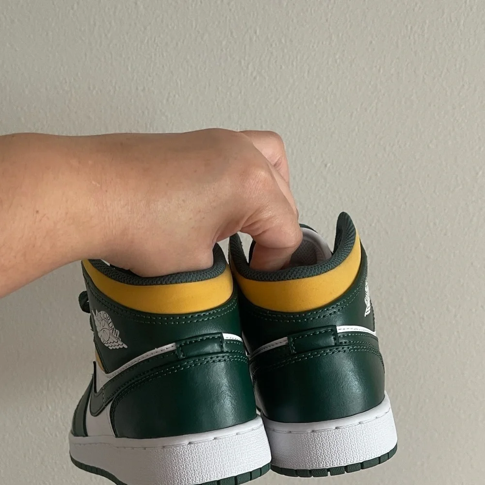 Nike sneakers featuring